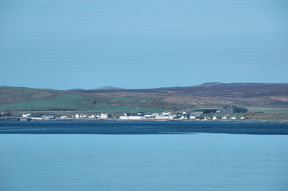Picture of the village of Bruichladdich, seen across Loch Indaal, a sea loch on Islay
