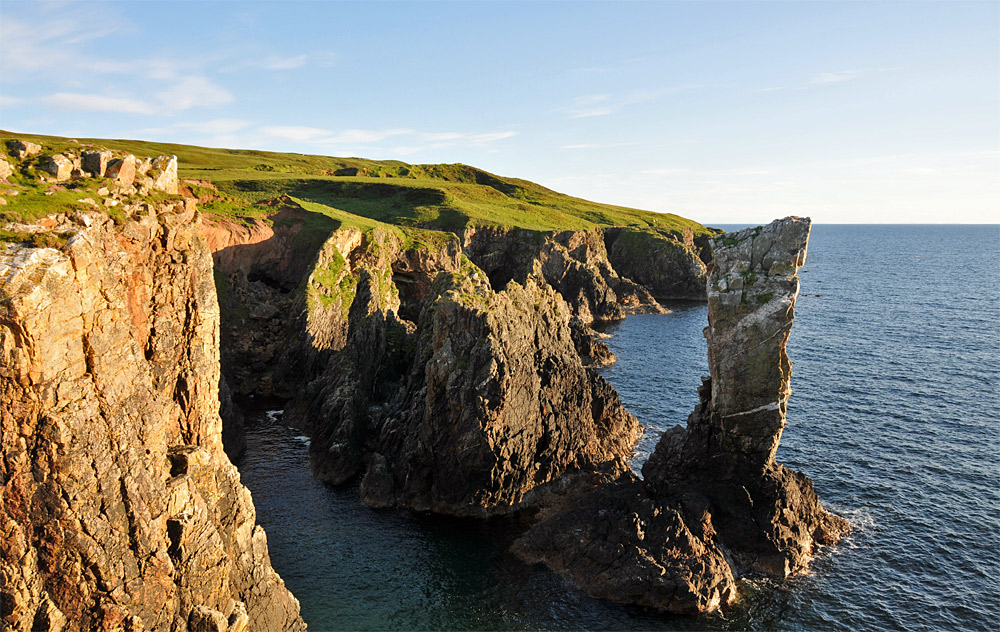 Picture of a sea stack and cliffs in the evening light