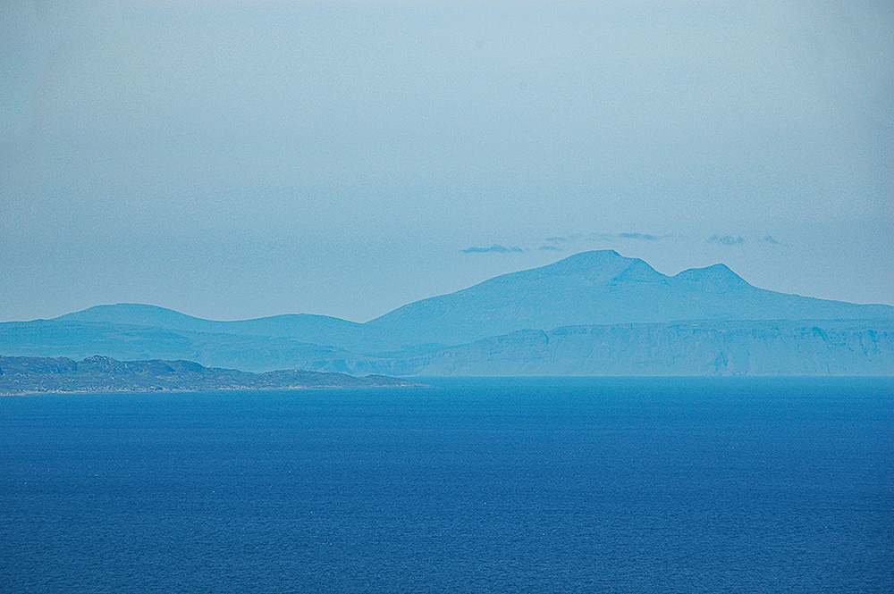 Picture of a view across the sea to two islands
