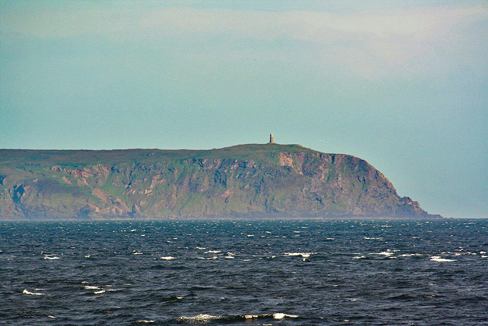 Picture of a monument tower on top of mull