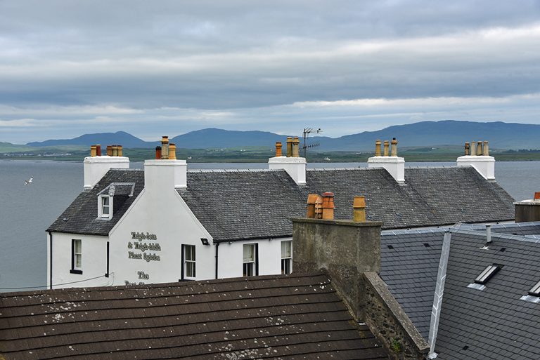 Port Charlotte Hotel across the rooftops, Isle of Islay Islay