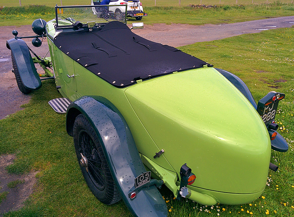 Picture of the rear of a green vintage Talbot London