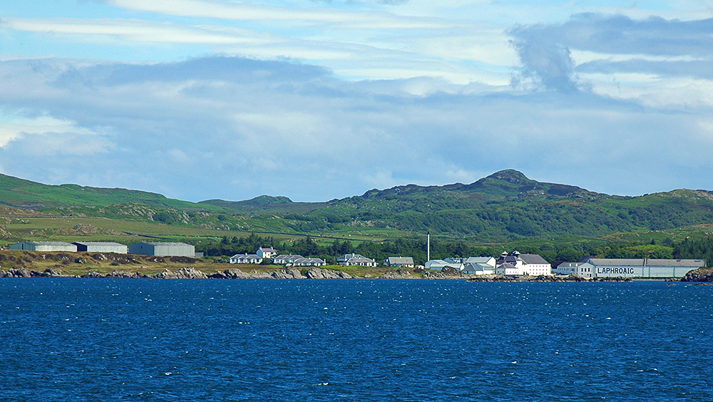 Picture of Laphroaig distillery on Islay seen from a passing ferry
