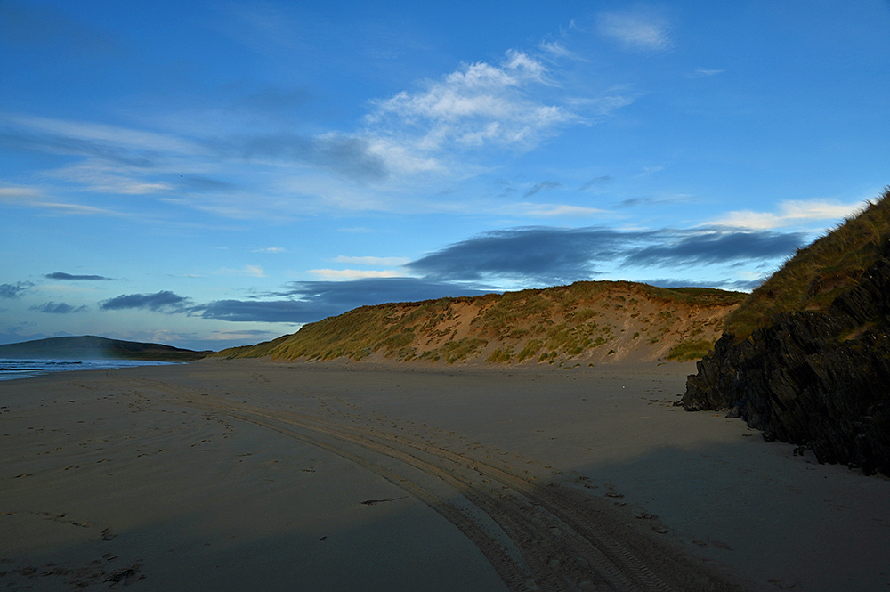 Picture of a dune behind a beach in some mild low November afternoon light