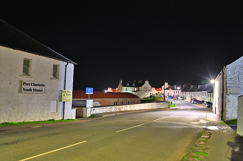 Picture of a quiet coastal village street at night