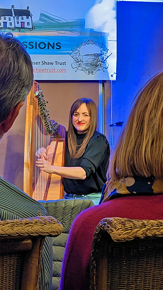 Picture of Rachel Hair playing the harp at the Islay Sessions 2022