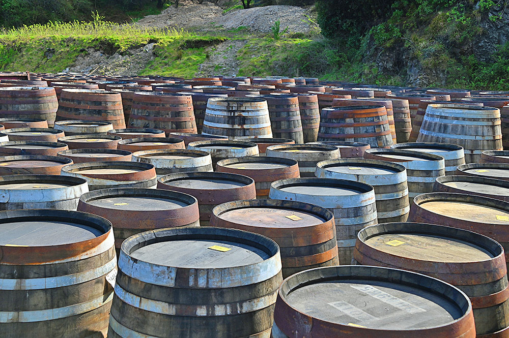 Picture of some (empty) whisky casks outside a distillery
