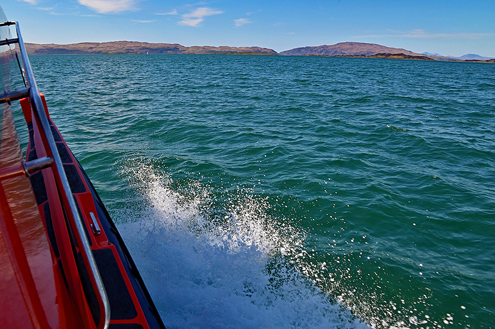 Picture of a view from a RIB on the way to a narrow sound between two islands
