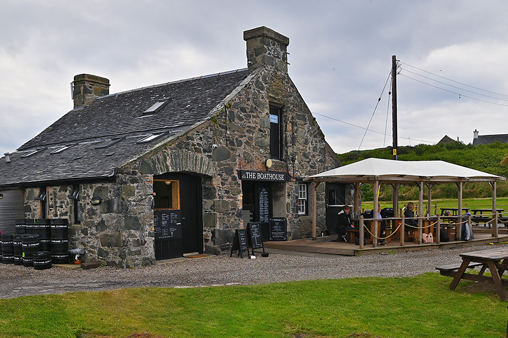 Picture of The Boathouse restaurant under a cloudy sky on the Isle of Gigha
