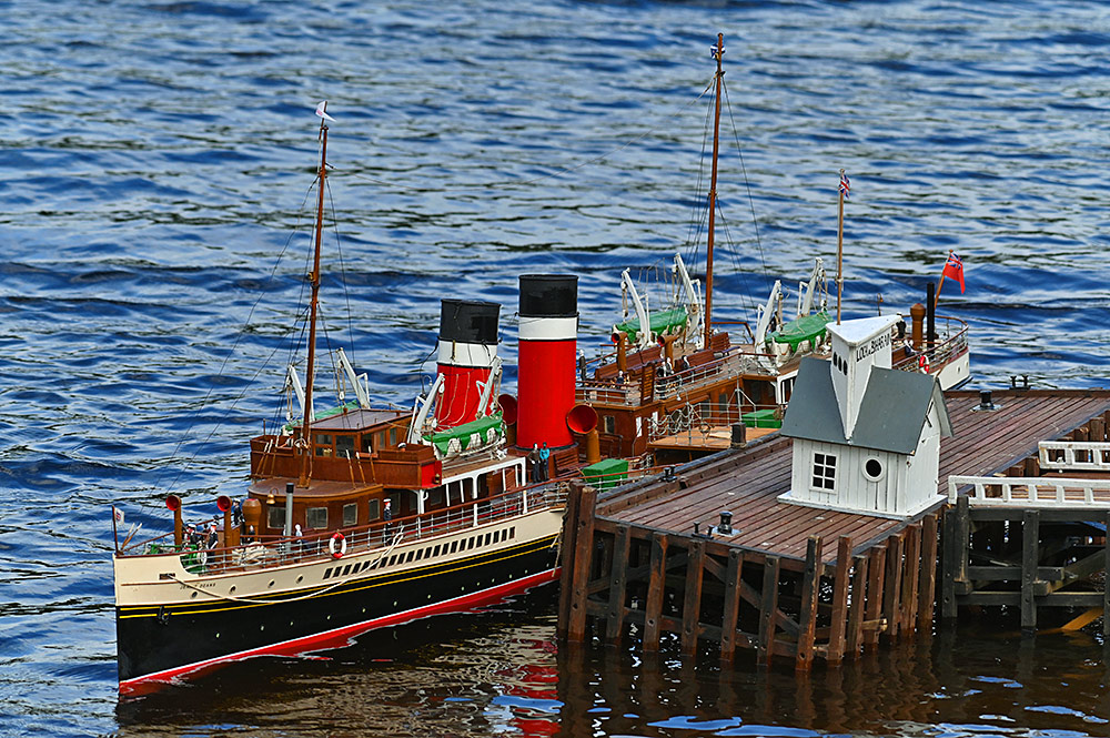 Picture of a model steamer at a model pier