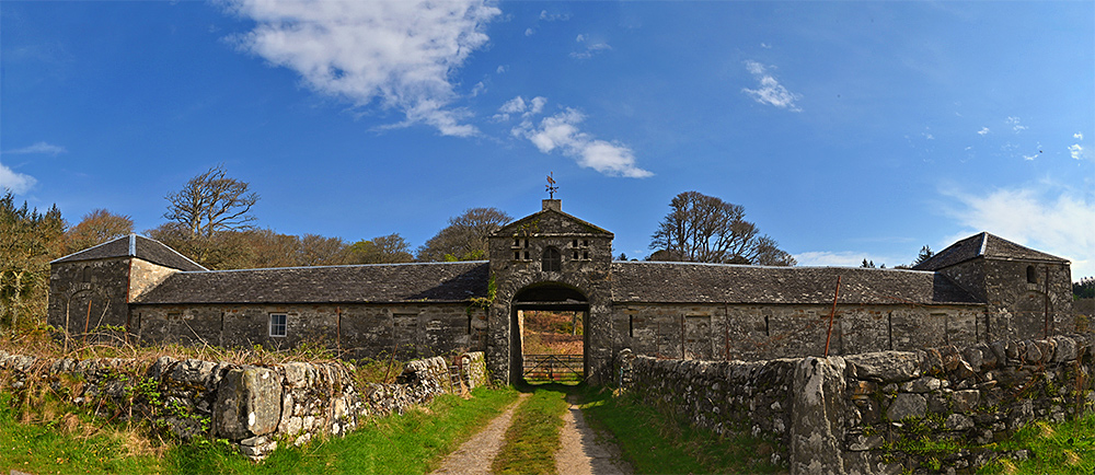 Panoramic picture of an old stone farm building