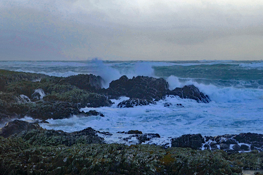 Picture of storm waves breaking and crashing over cliffs