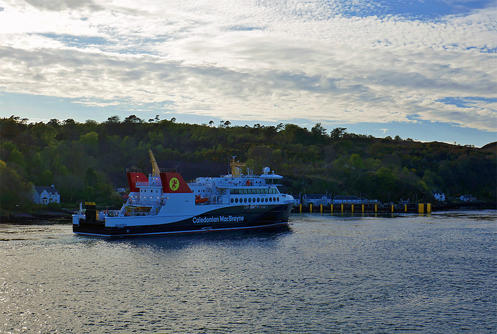 Picture of a Calmac ferry (MV Isle of Islay) arriving at an island ferry port (Port Askaig on Islay)