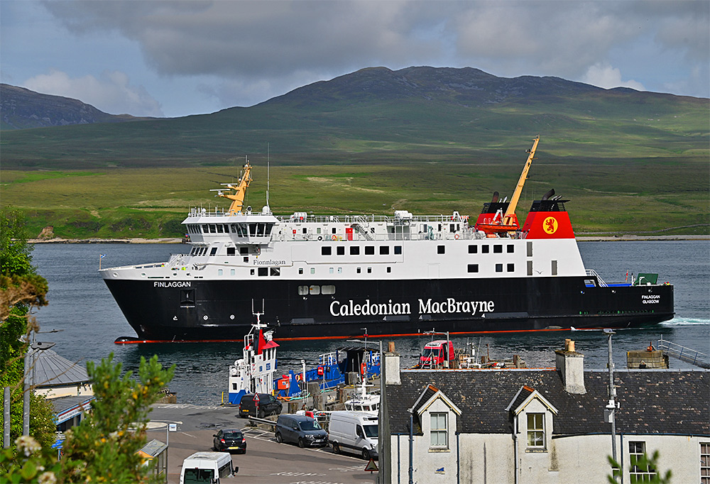 Picture of the Calmac ferry MV Finlaggan slowly arriving at the pier in Port Askaig on the Isle of Islay